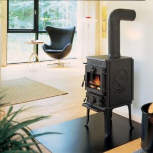 The Morso 1410 Radiant Wood Stove is perfect for small rooms. Its classic cast iron wood stove is decorated with Morso's iconic squirrel on the sides.