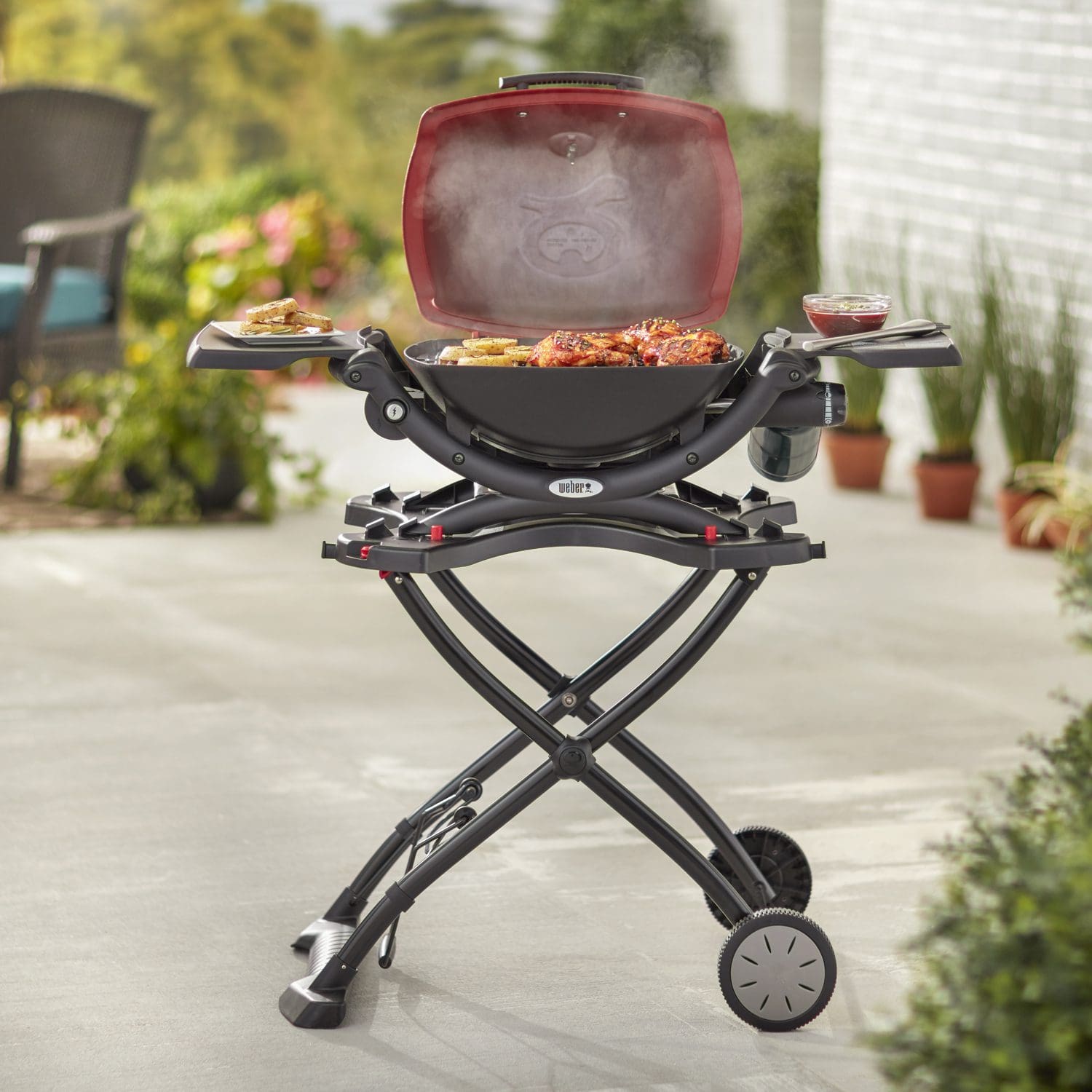 The Weber Q 1200 Portable Gas Grill in red