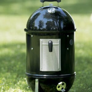 The Weber Smokey Mountain Charcoal Smoker 14" includes two layered grill grates and a built-in water pan for efficient use of space and smoke.