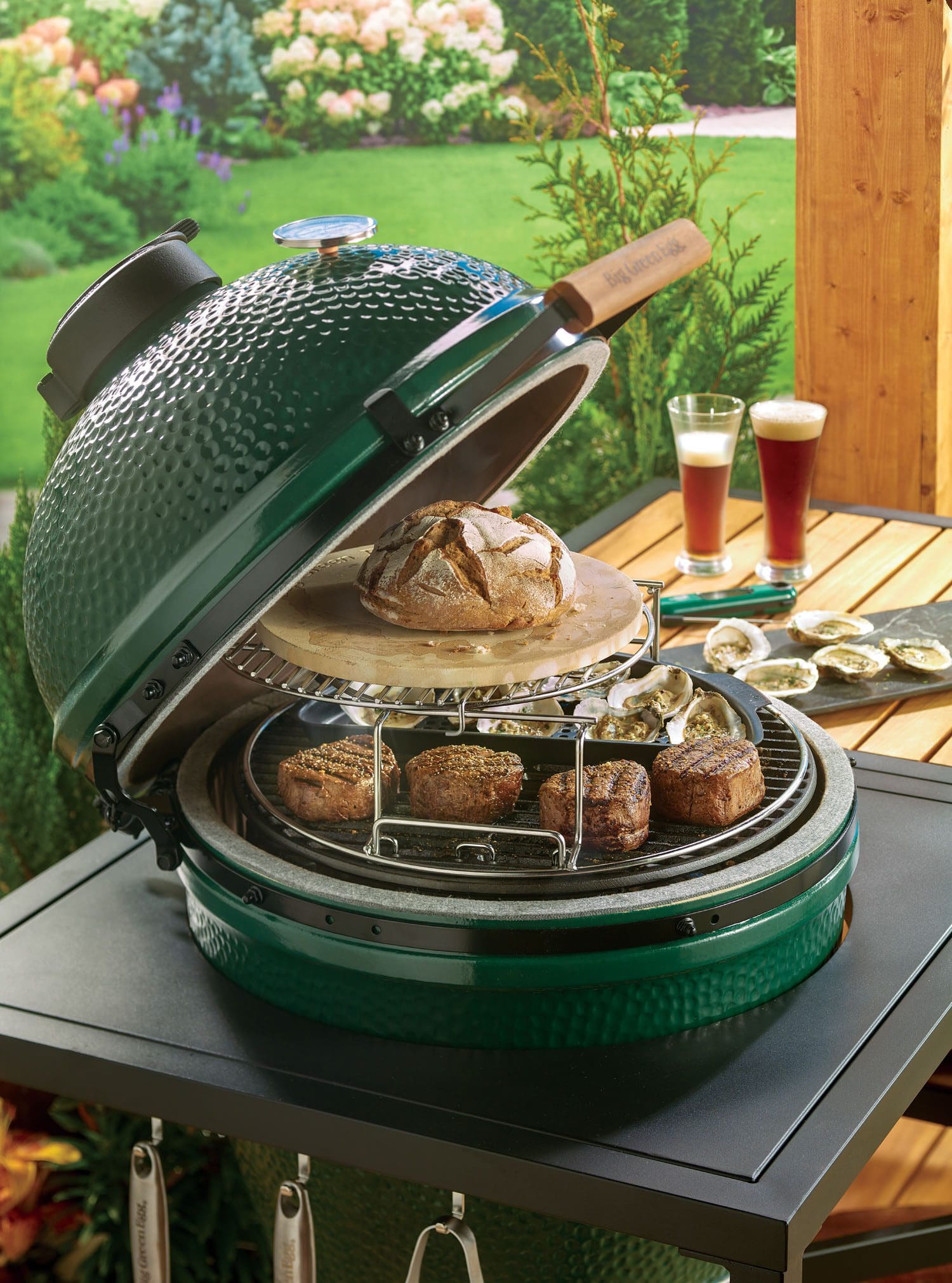 The Big Green Egg large ceramic smoker can bake bread, cook steaks, and more.
