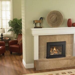 Picture of the Regency L234 small gas insert with contemporary surround in a traditional tan tiled fireplace