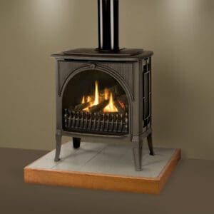 Product image of the Valor Madrona freestanding gas stove with traditional cast iron finishes and an arched front window