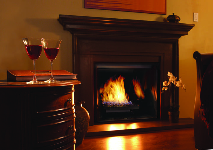 The Town & Country TC30 Gas Fireplace with a dark cherry wood exterior