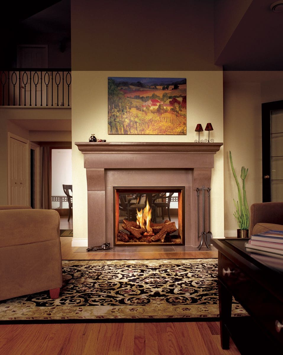 The Town & Country TC36 See Thru Gas Fireplace with a wood mantle in a living room