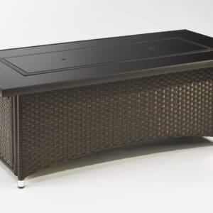 The Balsam Montego linear gas firepit combines the modern look of a black glass tabletop with a balsam wicker base for a transitional, versatile design.