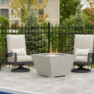 The Cove Square firepit includes a grey glass burner cover to make the Cove Square a functional table top when not in use.
