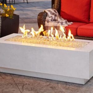 The Outdoor Greatroom Linear Gas Firepit Table is a stunning modern take on the contemporary concrete trend. Available in grey, white, or a black finish.