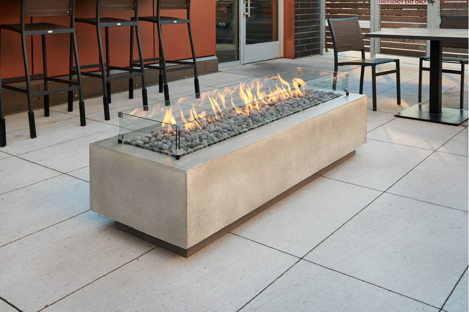 The Cove 72" Linear firepit is a stunning modern take on the contemporary concrete trend. Available in a natural grey, white, or midnight mist black finish.