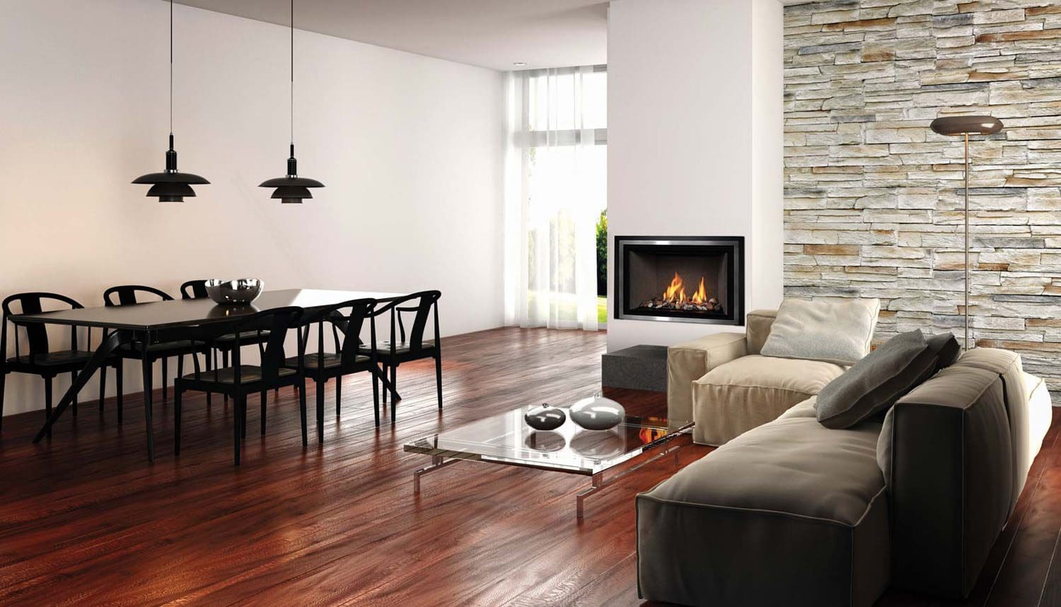 Modern living and dining area with dark wood floors, a beige sofa, glass coffee table, stone accent wall featuring a Mendota FV44i Gas Insert fireplace, and a dining table with black chairs under pendant lights. Large windows provide natural light.