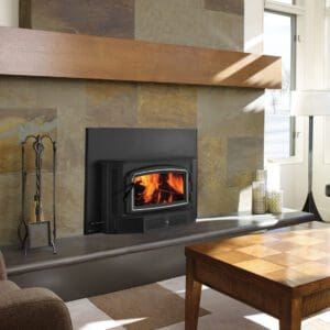 Regency Classic I2450 wood insert with Nickel accented door and optional blower in rajah slate tile fireplace