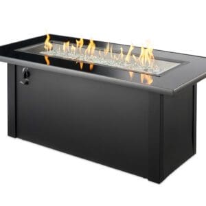The Monte Carlo rectangular firepit table has a contemporary black glass top that reflects the beautiful flame and enhances the overall outdoor experience.