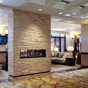 The Ortal Tunnel series gas fireplace features clean lines, a frameless design, and even indoor/outdoor applications to suit any space.