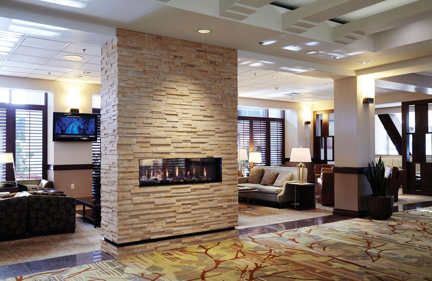 The Ortal Tunnel series gas fireplace features clean lines, a frameless design, and even indoor/outdoor applications to suit any space.