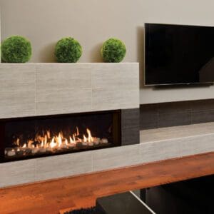 The Valor L2 Linear Gas Fireplace comes in a sleek, modern option with Murano glass and reflective interior or Splitwood logs for a more traditional look.