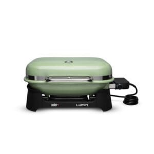 Picture of the Weber Lumin electric grill series in the seafoam green enamel finish