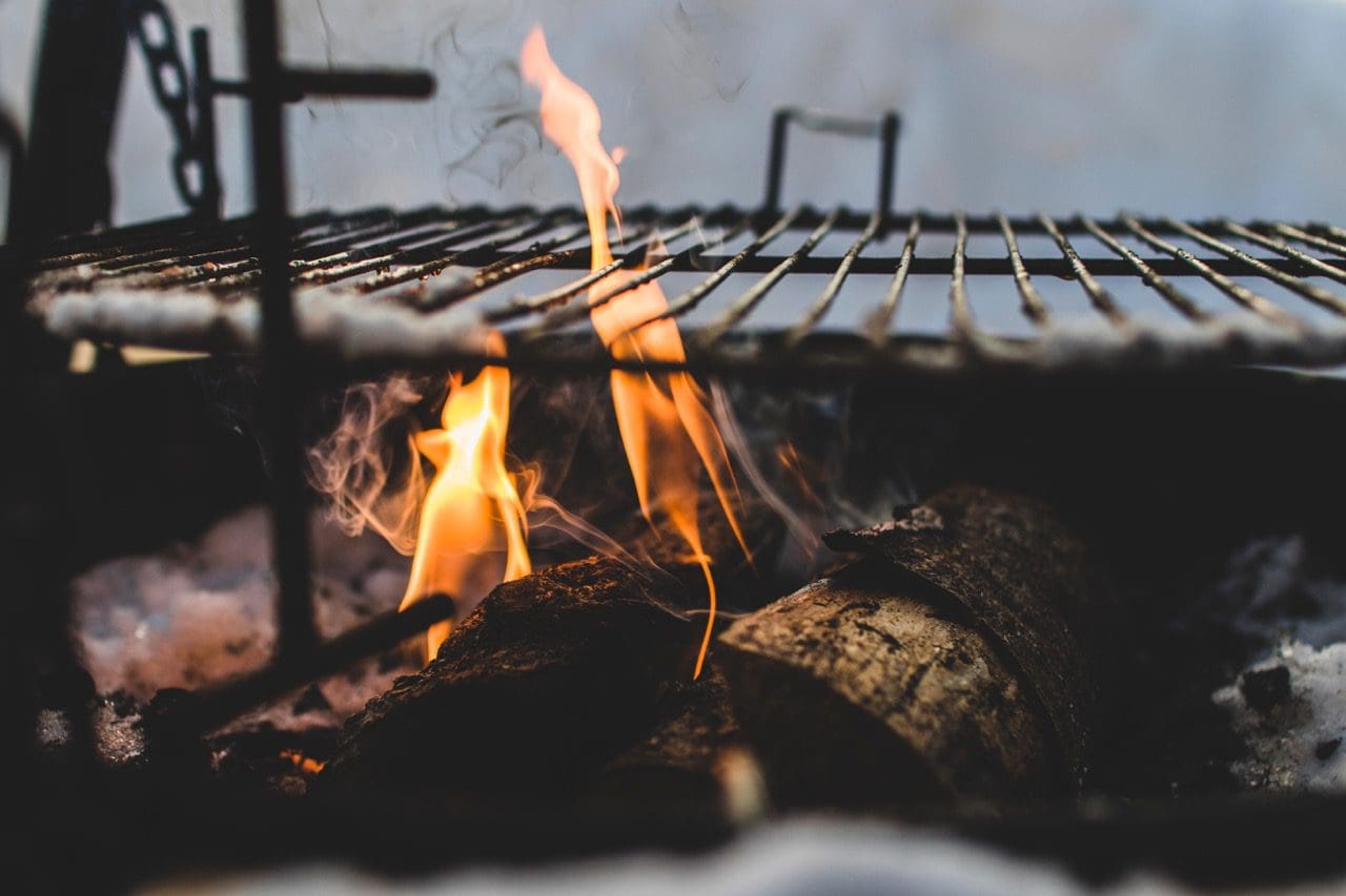 How do you decide between charcoal vs gas grills?