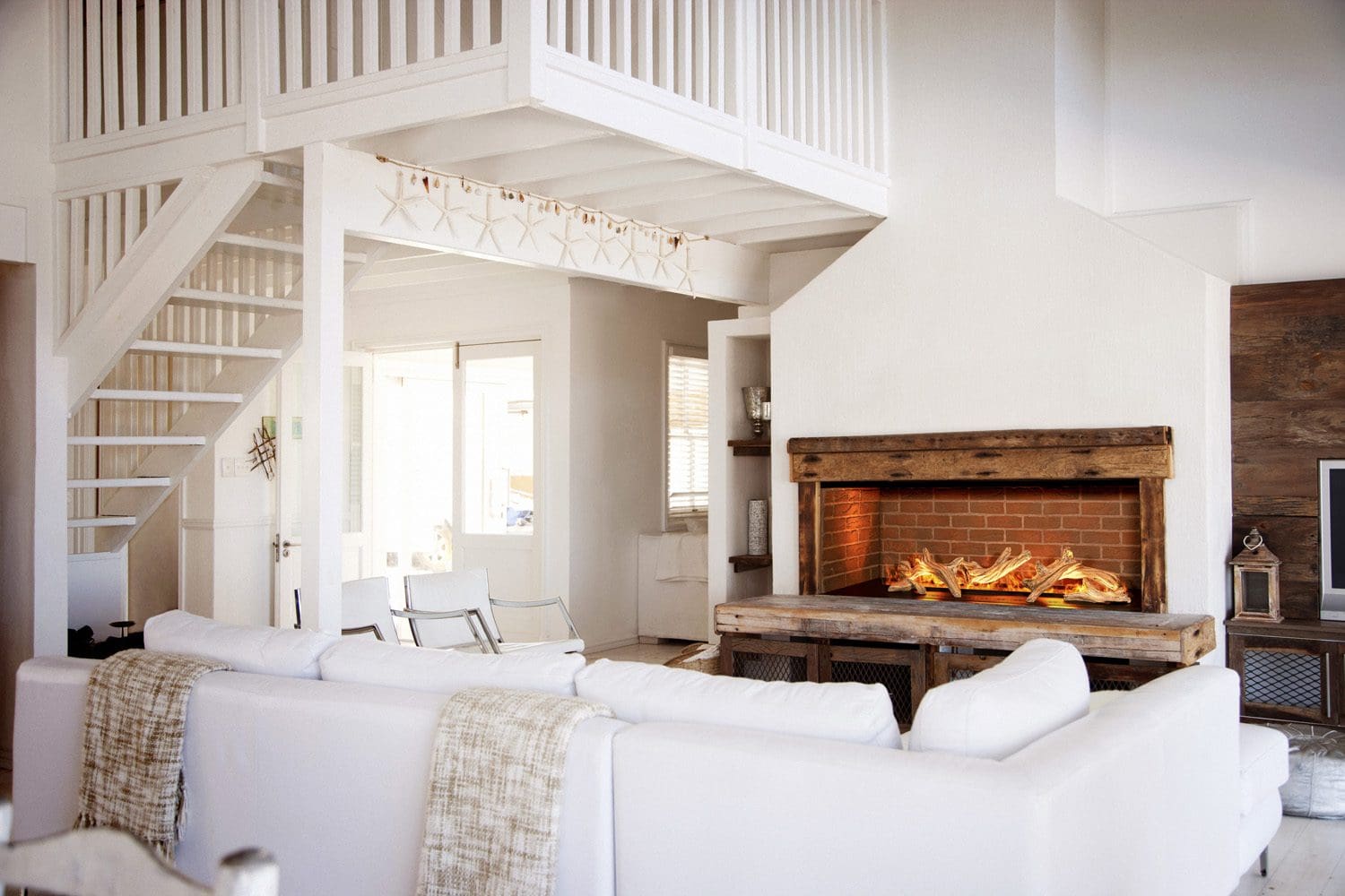 NetZero Waterplace electric fireplace with a logset